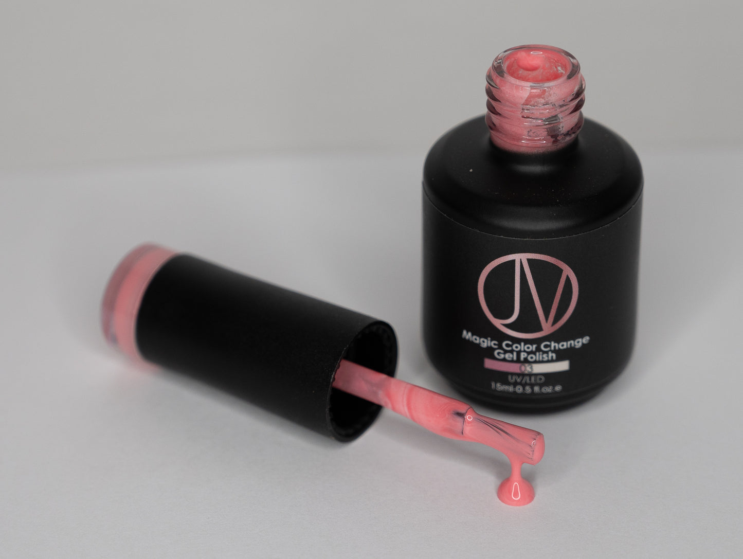 Color-changing gel polish in Sunset Sands - salon-quality, UV/LED-cured polish that transitions from a warm mauve-pink to a soft nude beige with temperature shifts.